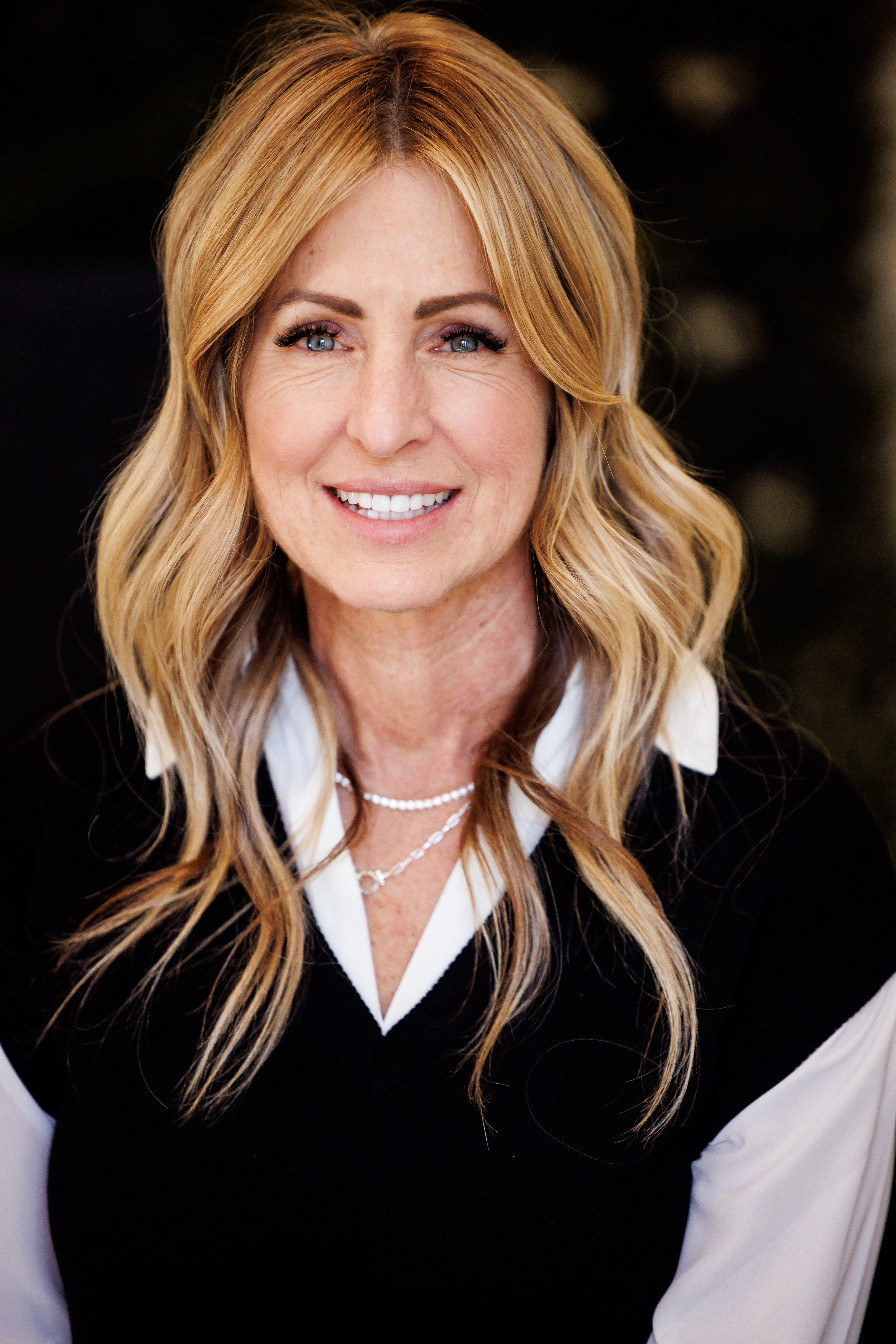 Portrait of Shannon, a Licensed Marriage and Family Therapist specializing in trauma therapy, sports psychology, and performance mental health.